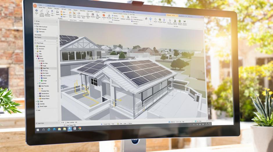 Solaranlage-kaufen Ein Computermonitor zeigt die 3D Planung einer Solaranlage auf einem Hausdach